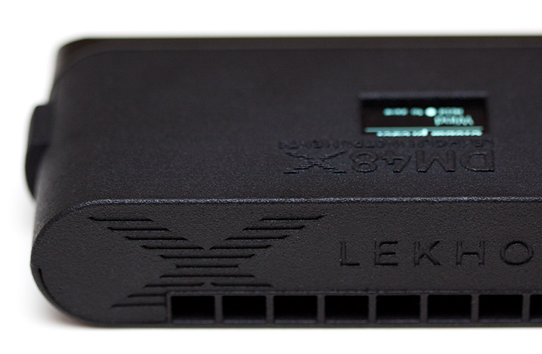 Close-up of the DM48X casing, OLED display and mouthpiece